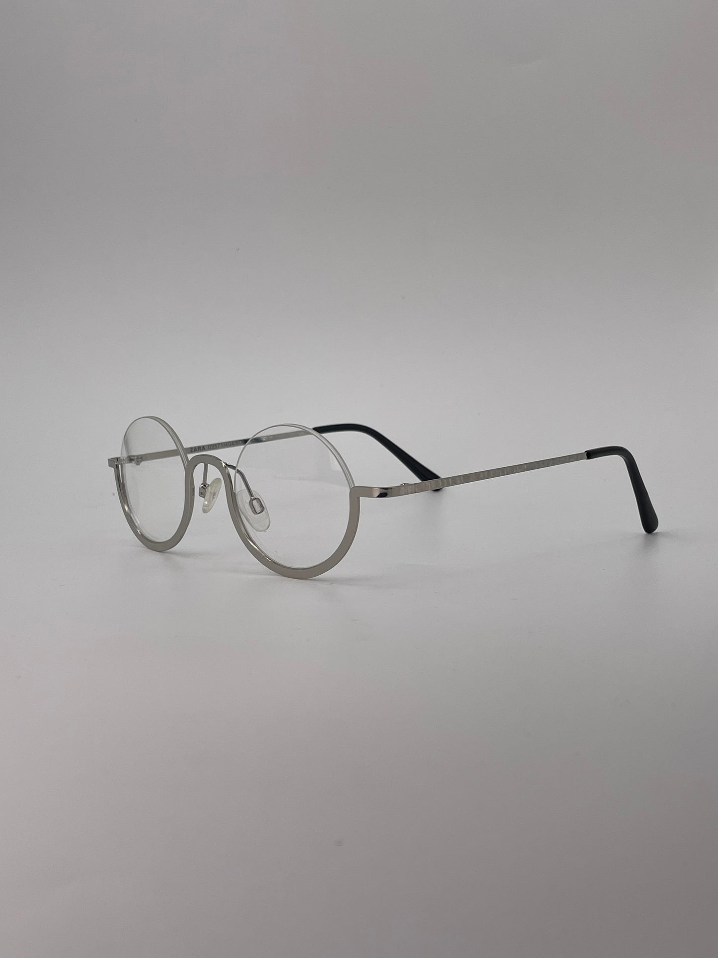 Silver half rimless round optics-444